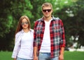 Portrait of beautiful young couple wearing a sunglasses Royalty Free Stock Photo