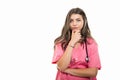 Portrait of beautiful young doctor wearing scrubs making thinking position Royalty Free Stock Photo