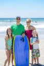 Portrait of a beautiful young Family at the beach Royalty Free Stock Photo