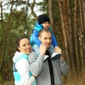 Portrait of beautiful young family of three Royalty Free Stock Photo