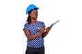 Young female engineer writing in a clipboard Royalty Free Stock Photo