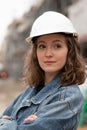 Attractive construction manager posing with folded arms Royalty Free Stock Photo