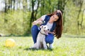 Portrait of Beautiful young girl with her dogs Royalty Free Stock Photo