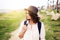 Portrait of a beautiful young girl with a hipster hat, summer wa Royalty Free Stock Photo