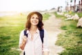 Portrait of a beautiful young girl with a hipster hat, summer wa Royalty Free Stock Photo