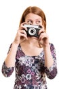 Portrait of a beautiful young girl holding a camera Royalty Free Stock Photo