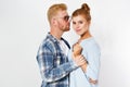 Portrait of a beautiful young happy smiling elegant couple - isolated mock up, background people.B eautiful young happy couple Royalty Free Stock Photo