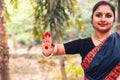 Portrait of beautiful young Indian classical odissi dancer wears traditional costume and posing Odissi dance mudra in the