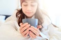 Portrait of a beautiful young lady drinking her morning coffee in her bedroom Royalty Free Stock Photo