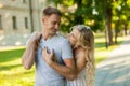 Portrait of beautiful young loving couple smiling outdoors Royalty Free Stock Photo