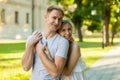 Portrait of beautiful young loving couple smiling outdoors Royalty Free Stock Photo