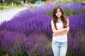 Portrait of a beautiful young modern woman outdoors. Student in the park. Royalty Free Stock Photo