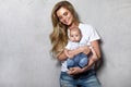 Beautiful young mother with her cute baby boy Royalty Free Stock Photo