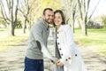 Portrait of beautiful young pair in a park Royalty Free Stock Photo