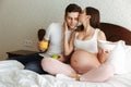 Portrait of a beautiful young pregnant couple Royalty Free Stock Photo