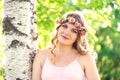 Portrait of a beautiful young pregnant woman in a wreath of rose Royalty Free Stock Photo