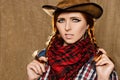 Portrait of a beautiful young red-haired girl in a cowboy hat Royalty Free Stock Photo