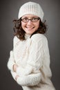 Portrait of a beautiful young smiling brunette wearing chochet h Royalty Free Stock Photo