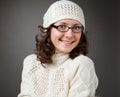 Portrait of a beautiful young smiling brunette wearing chochet h Royalty Free Stock Photo