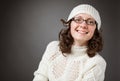 Portrait of a beautiful young smiling brunette wearing chochet h Royalty Free Stock Photo