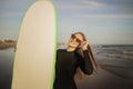 Portrait Of Beautiful Young Surfer Lady Holding Big Blank Surfboard Royalty Free Stock Photo