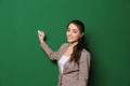 Portrait of beautiful young teacher writing Royalty Free Stock Photo