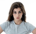 Portrait of a beautiful young woman with angry face looking furious. Human expressions and emotions Royalty Free Stock Photo