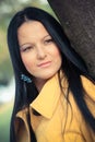 Portrait of beautiful young woman in autumn park Royalty Free Stock Photo