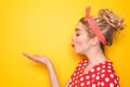 Portrait of beautiful young woman blowing kiss on color background Royalty Free Stock Photo