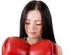 Portrait of beautiful young woman with boxing gloves and closed Royalty Free Stock Photo