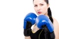 Portrait of a beautiful young woman in boxing gloves Royalty Free Stock Photo