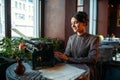 Portrait of beautiful young woman in cafe Royalty Free Stock Photo