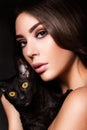 Portrait of the beautiful young woman with cat Royalty Free Stock Photo