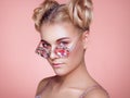 Portrait of beautiful young woman with colored glasses Royalty Free Stock Photo