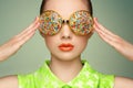 Portrait of beautiful young woman with colored glasses Royalty Free Stock Photo