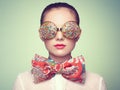 Portrait of beautiful young woman with colored glasses Royalty Free Stock Photo