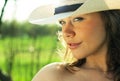 Portrait of beautiful young woman cowgirl in hat