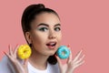 Portrait of a beautiful young woman with donuts earrings Royalty Free Stock Photo