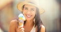 Portrait of a beautiful young woman eating ice cream during a hot summer day Royalty Free Stock Photo