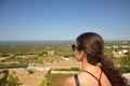 Portrait of beautiful young woman enjoying nature from the hill Royalty Free Stock Photo