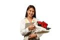 Portrait of beautiful young woman florist holding beautiful bouquet of red roses isolated on white background Royalty Free Stock Photo