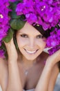Portrait of beautiful young woman with flower wreath on her head Royalty Free Stock Photo