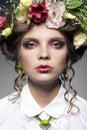 Portrait of beautiful young woman with flowers in hair Royalty Free Stock Photo