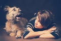 Portrait of a beautiful young woman with a funny shaggy dog on a