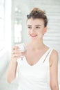 Portrait of a beautiful woman drinking water Royalty Free Stock Photo