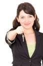 Portrait of beautiful young woman holding key Royalty Free Stock Photo