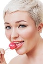 Portrait of beautiful young woman with lollipop Royalty Free Stock Photo