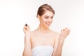 Portrait of beautiful young woman painting her nails Royalty Free Stock Photo