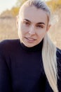 portrait of a beautiful young woman in a park Royalty Free Stock Photo