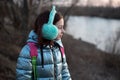 Portrait of beautiful young woman. Plein air photo shoot near river at winter Royalty Free Stock Photo